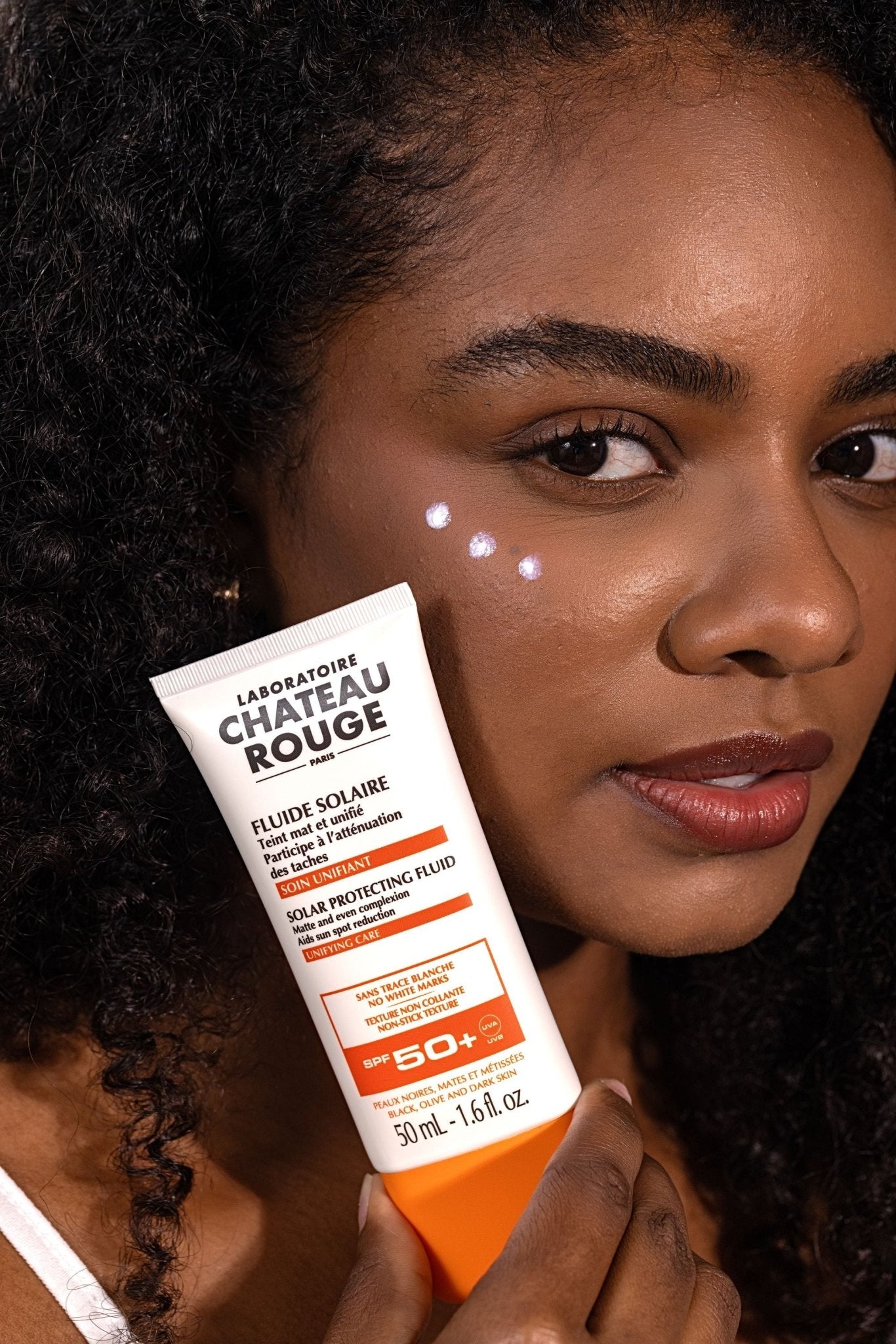 SUN FLUID Protection SPF 50+ ANTI SPOTS - ShanShar Beauty : The world of beauty.